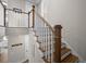 Elegant staircase with wood treads and white risers at 637 Lynne Ave, Charleston, SC 29412