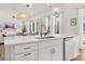 Bright, modern kitchen with island seating, stainless steel appliances, and ample natural light at 703 Blueway Ave, Summerville, SC 29486