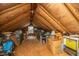 Finished attic space featuring wood floors and ample room for storage or conversion to living space at 802 Robert E. Lee Blvd, Charleston, SC 29412