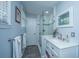 Bright bathroom with a frameless glass shower, modern vanity, and stylish finishes at 802 Robert E. Lee Blvd, Charleston, SC 29412