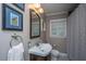 Cozy bathroom featuring decorative mirror and shower with curtain, perfect for relaxation at 802 Robert E. Lee Blvd, Charleston, SC 29412