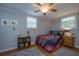 Inviting bedroom with soft natural light, neutral paint and ceiling fan at 802 Robert E. Lee Blvd, Charleston, SC 29412