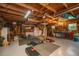A well-lit garage features organized storage solutions, a workbench and a fitness corner at 802 Robert E. Lee Blvd, Charleston, SC 29412