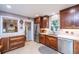 Bright kitchen featuring stainless steel appliances, beautiful countertops, and wood cabinets for ample storage at 802 Robert E. Lee Blvd, Charleston, SC 29412