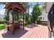 An outdoor deck with a beverage center, seating and fire pit is the perfect spot for entertainment at 8320 Tyrian Path, North Charleston, SC 29418