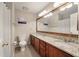Large bathroom with dual sinks, a large mirror, and plenty of counter space at 8320 Tyrian Path, North Charleston, SC 29418