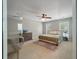 Serene bedroom with neutral tones, carpet flooring, ceiling fan, and a dresser at 8320 Tyrian Path, North Charleston, SC 29418