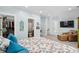 Primary bedroom shows an open door to walk-in closet, shower room and a seating area with a TV at 907 High Nest Ln, Charleston, SC 29412