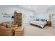 Spacious bedroom with comfortable seating and decor for relaxation and rest, with carpet flooring at 907 High Nest Ln, Charleston, SC 29412
