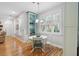 Cozy dining area with a round table, built-in shelving, and natural light from a nearby window at 907 High Nest Ln, Charleston, SC 29412