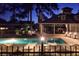 Inviting community pool with lounge chairs provides a relaxing nighttime experience at 907 High Nest Ln, Charleston, SC 29412