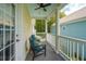 Inviting covered porch featuring comfortable seating, cool color scheme, and a relaxing outdoor atmosphere at 907 High Nest Ln, Charleston, SC 29412