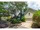 Street view of charming homes with well-manicured lawns and lush landscaping at 907 High Nest Ln, Charleston, SC 29412