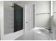 Modern bathroom featuring sleek vanity, shower with glass door, and neutral color palette at 9255 Ayscough Rd, Summerville, SC 29485