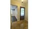 Home foyer featuring tile flooring and decorative front door, creating a delightful entrance at 963 Yorktown Dr, Charleston, SC 29412
