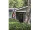 Charming home exterior with neat landscaping, front door and American flag at 963 Yorktown Dr, Charleston, SC 29412