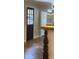 View of a dark wood door and an island bar, showcasing the home's interior design at 963 Yorktown Dr, Charleston, SC 29412