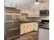 Beautifully updated kitchen with stainless steel appliances, stylish cabinets, and ample counter space at 963 Yorktown Dr, Charleston, SC 29412