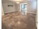 Spacious living room with travertine tile flooring and natural light at 963 Yorktown Dr, Charleston, SC 29412