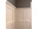 Close up of paneled wall with ornate molding in a well lit room of the home at 963 Yorktown Dr, Charleston, SC 29412