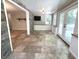 Bright sun room with travertine tile floors, natural light, and a view of the outdoors at 963 Yorktown Dr, Charleston, SC 29412