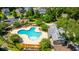 The community pool has a playground, lounge chairs, a clubhouse, and neighborhood homes nearby at 9710 Table Mountain Ln, Ladson, SC 29456