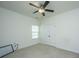 Well-lit bedroom with ceiling fan and carpet flooring at 9710 Table Mountain Ln, Ladson, SC 29456