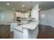 Modern kitchen boasts granite counters, stainless appliances, a functional design and a breakfast bar at 9710 Table Mountain Ln, Ladson, SC 29456