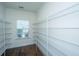 Walk-in pantry with wire shelving and a window for natural light at 9710 Table Mountain Ln, Ladson, SC 29456