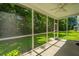 Relaxing screened-in porch perfect for outdoor enjoyment at 9710 Table Mountain Ln, Ladson, SC 29456
