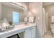 Bright bathroom featuring a white vanity, ample storage, and a classic design at 1 King St # 209 & 210, Charleston, SC 29401