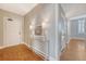 Inviting foyer with tiled floors, elegant console table, and stylish lighting at 1 King St # 209 & 210, Charleston, SC 29401