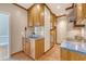 Charming kitchen with blue countertops, custom cabinetry, and modern appliances at 1 King St # 209 & 210, Charleston, SC 29401