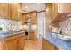 Stylish kitchen featuring custom cabinetry, unique backsplash, and stainless steel appliances at 1 King St # 209 & 210, Charleston, SC 29401