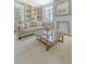 Bright living room features neutral colors, fireplace, built-ins, and natural light at 1 King St # 209 & 210, Charleston, SC 29401