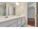 Bathroom featuring double sinks and a view into an adjacent bedroom at 100 Dacs Ln, Summerville, SC 29483