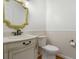 Elegant bathroom with marble vanity and decorative mirror at 100 Dacs Ln, Summerville, SC 29483