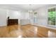 Open dining area featuring hardwood floors, a chandelier, and natural light at 100 Dacs Ln, Summerville, SC 29483