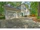 Spacious three-car garage with ample parking space and side yard access at 100 Dacs Ln, Summerville, SC 29483