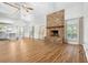 Open living room with exposed brick fireplace and high ceilings at 100 Dacs Ln, Summerville, SC 29483