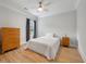 Cozy bedroom with hardwood floors, neutral paint, and natural light at 1000 Retreat Ave, Moncks Corner, SC 29461