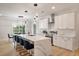 Spacious kitchen featuring a large island, modern appliances, and stylish pendant lighting fixtures at 1000 Retreat Ave, Moncks Corner, SC 29461