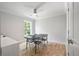 Simple, bright room featuring hardwood floors, a ceiling fan, and natural light from window at 1000 Retreat Ave, Moncks Corner, SC 29461