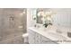 This primary bathroom features a spacious shower, double vanity with quartz countertops, and convenient storage at 1009 Marsh Harrier Dr # Cc3-2-2P, Ravenel, SC 29470