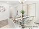Cozy dining room has seating for six, light walls, and modern lighting, perfect for dinner parties at 1009 Marsh Harrier Dr # Cc3-2-2P, Ravenel, SC 29470