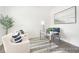 Bright, welcoming office space with comfortable seating, stylish glass desk, and soothing neutral tones at 1009 Marsh Harrier Dr # Cc3-2-2P, Ravenel, SC 29470