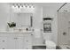 Well-lit bathroom with vanity and shower-tub combo at 1085 Harts Bluff Rd, Wadmalaw Island, SC 29487