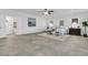 Generous bedroom with ensuite bathroom, a ceiling fan, and large windows at 1085 Harts Bluff Rd, Wadmalaw Island, SC 29487
