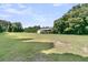 A beautiful lawn with plenty of space between buildings at 1085 Harts Bluff Rd, Wadmalaw Island, SC 29487