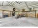 Large garage space with scaffolding, a high ceiling, and ample room for storage or projects at 1085 Harts Bluff Rd, Wadmalaw Island, SC 29487
